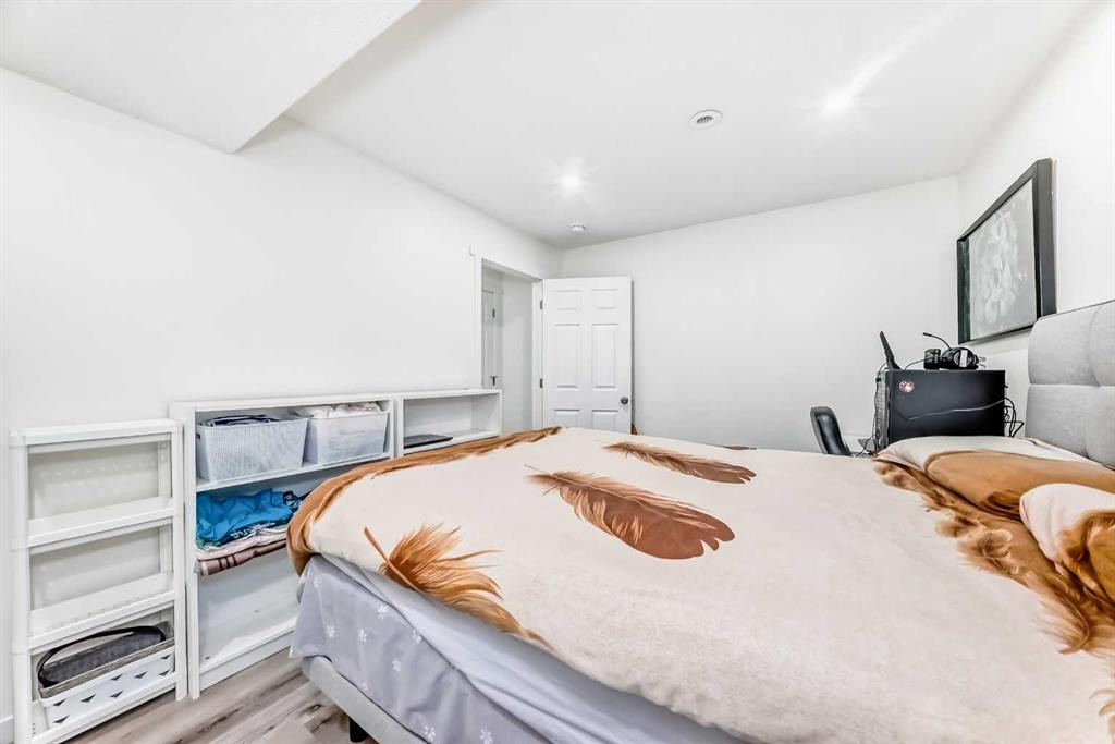 16 Carringvue Way Nw, Calgary, AB - Indoor Photo Showing Bedroom