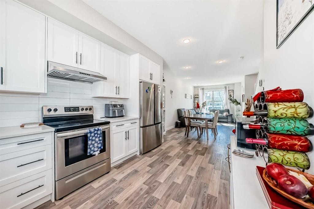 16 Carringvue Way Nw, Calgary, AB - Indoor Photo Showing Kitchen With Stainless Steel Kitchen With Upgraded Kitchen