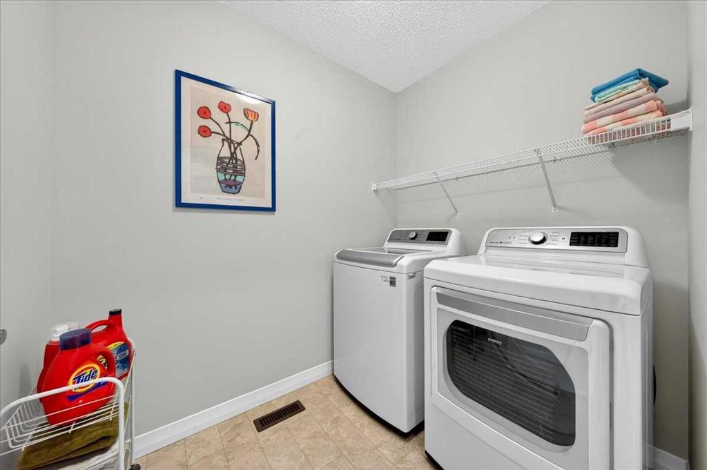 62 Evanscrest Road Nw, Calgary, AB - Indoor Photo Showing Laundry Room