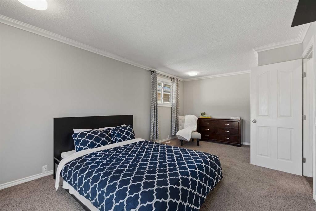 8011 Huntington Street Ne, Calgary, AB - Indoor Photo Showing Bedroom
