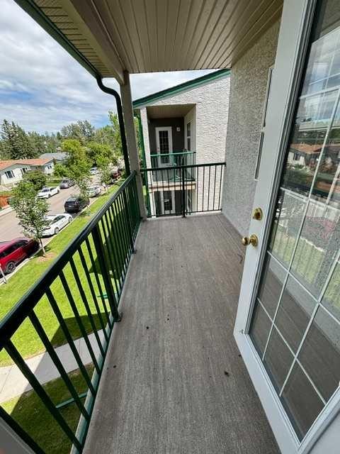 302-105 7 Avenue Se, High River, AB