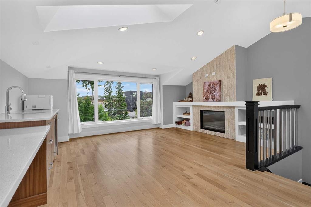 2219 2 Avenue Nw, Calgary, AB - Indoor Photo Showing Other Room With Fireplace