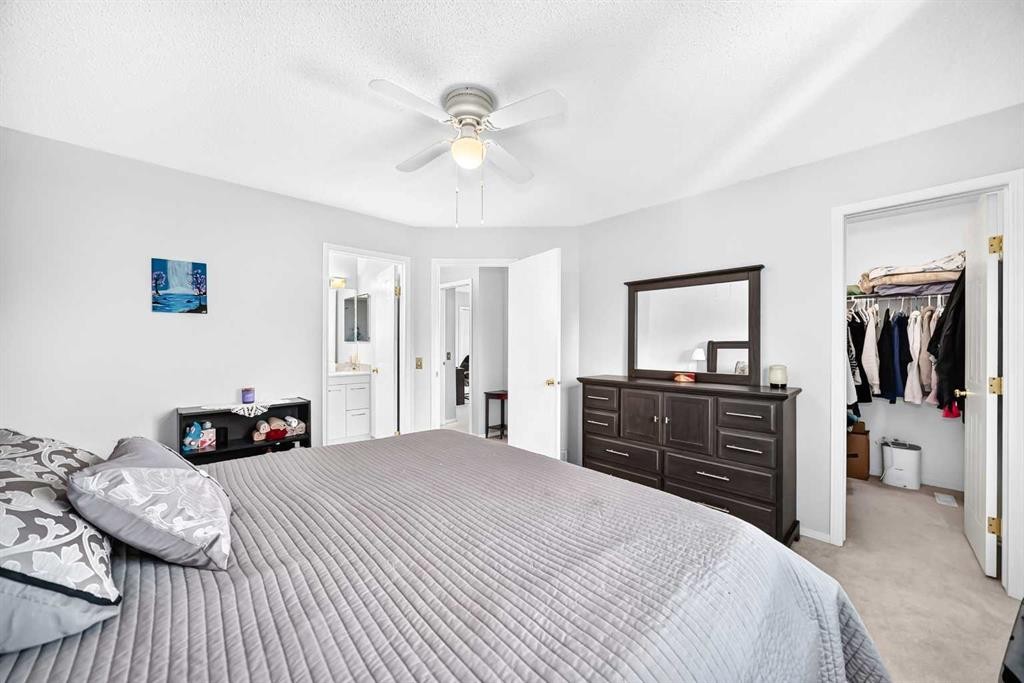 220 Shawbrooke Manor Sw, Calgary, AB - Indoor Photo Showing Bedroom