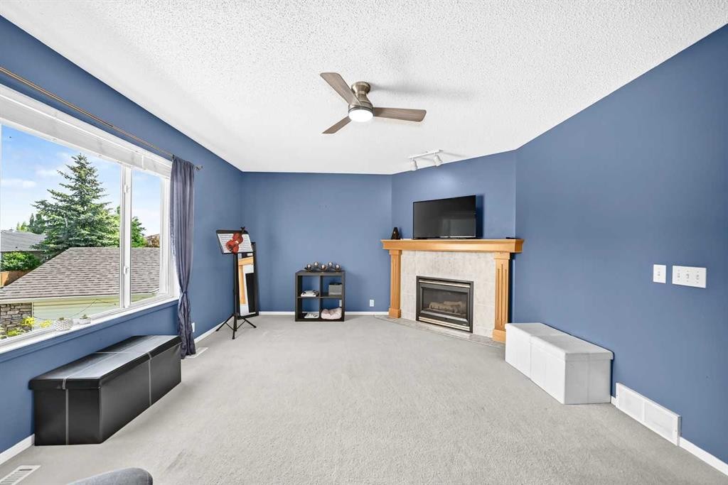 220 Shawbrooke Manor Sw, Calgary, AB - Indoor With Fireplace