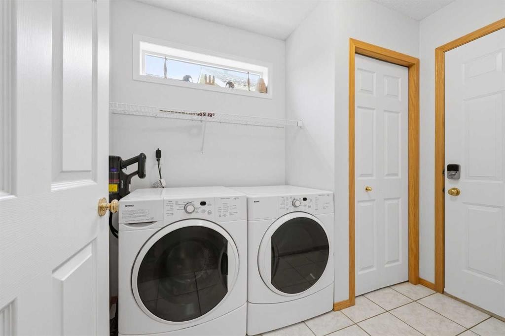 67 Sienna Heights Way Sw, Calgary, AB - Indoor Photo Showing Laundry Room