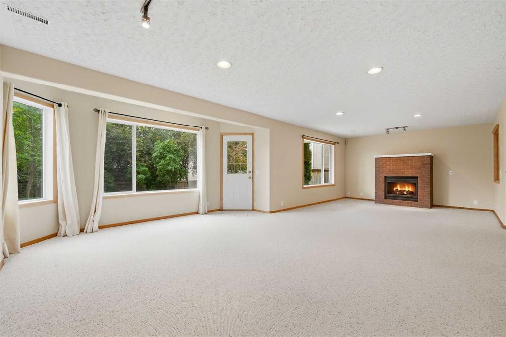 67 Sienna Heights Way Sw, Calgary, AB - Indoor With Fireplace