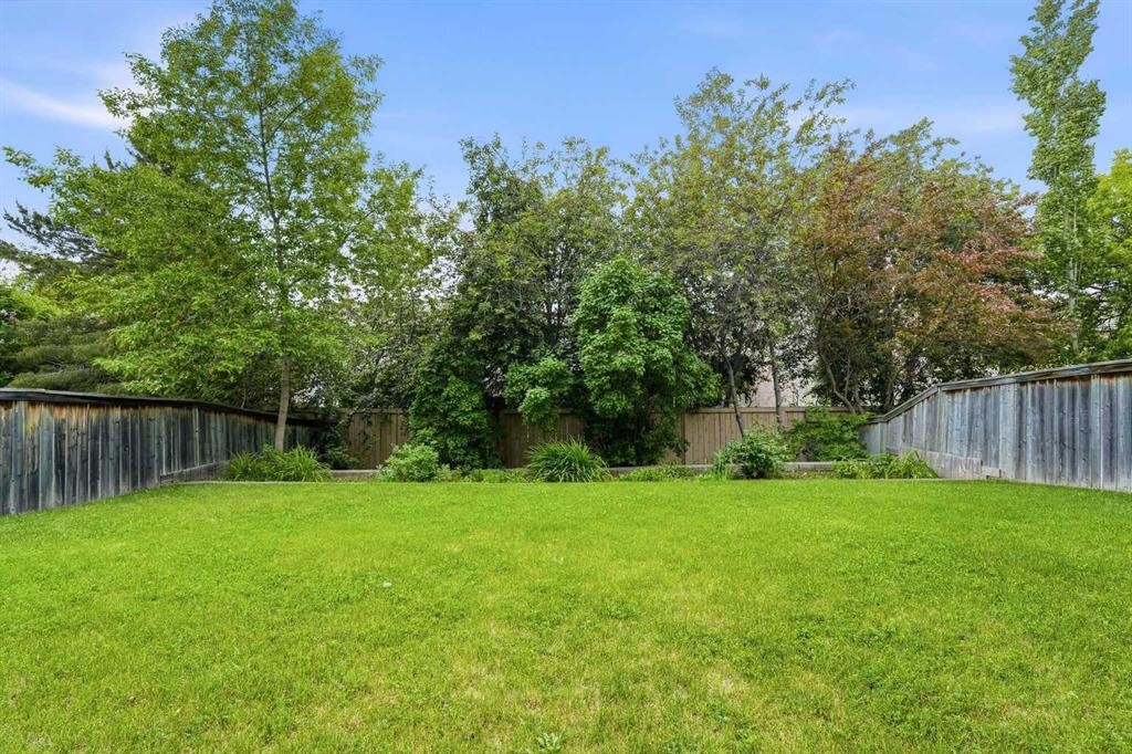 67 Sienna Heights Way Sw, Calgary, AB - Outdoor With Backyard