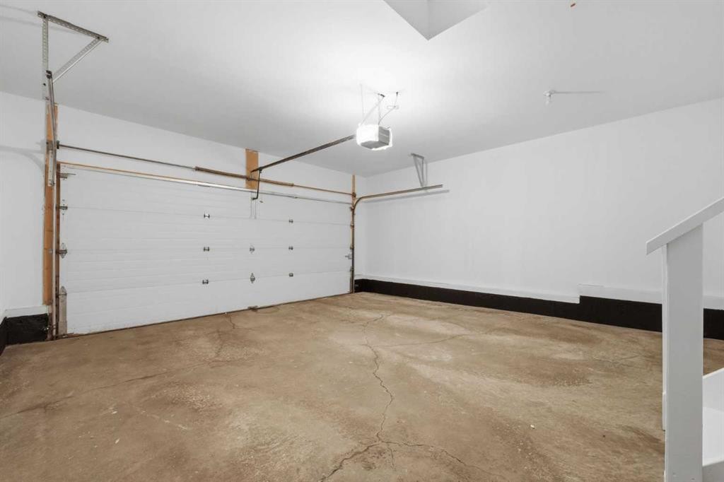 67 Sienna Heights Way Sw, Calgary, AB - Indoor Photo Showing Garage
