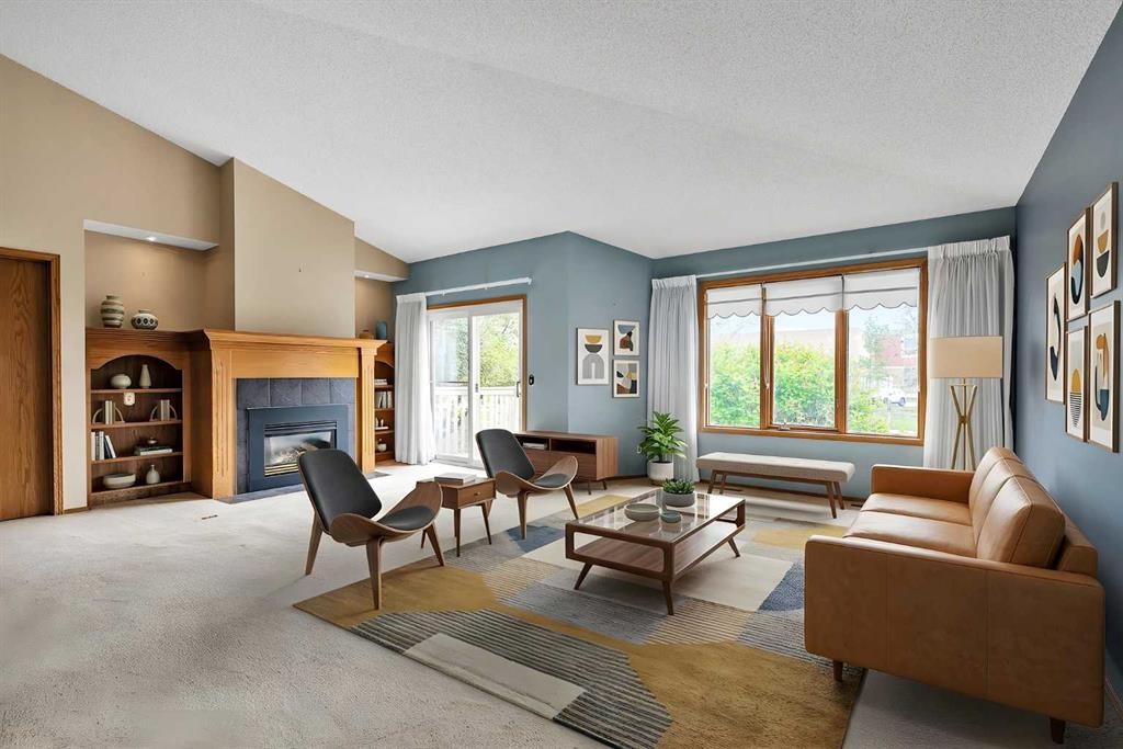 8 Edgepark Villas Nw, Calgary, AB - Indoor Photo Showing Living Room With Fireplace