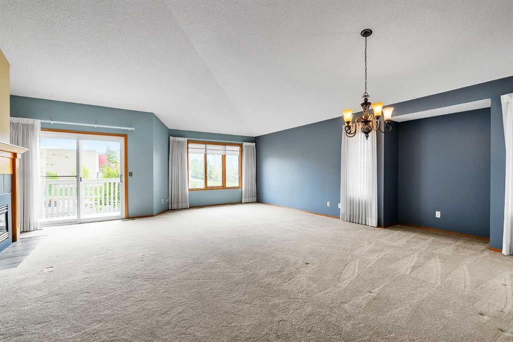 8 Edgepark Villas Nw, Calgary, AB - Indoor With Fireplace