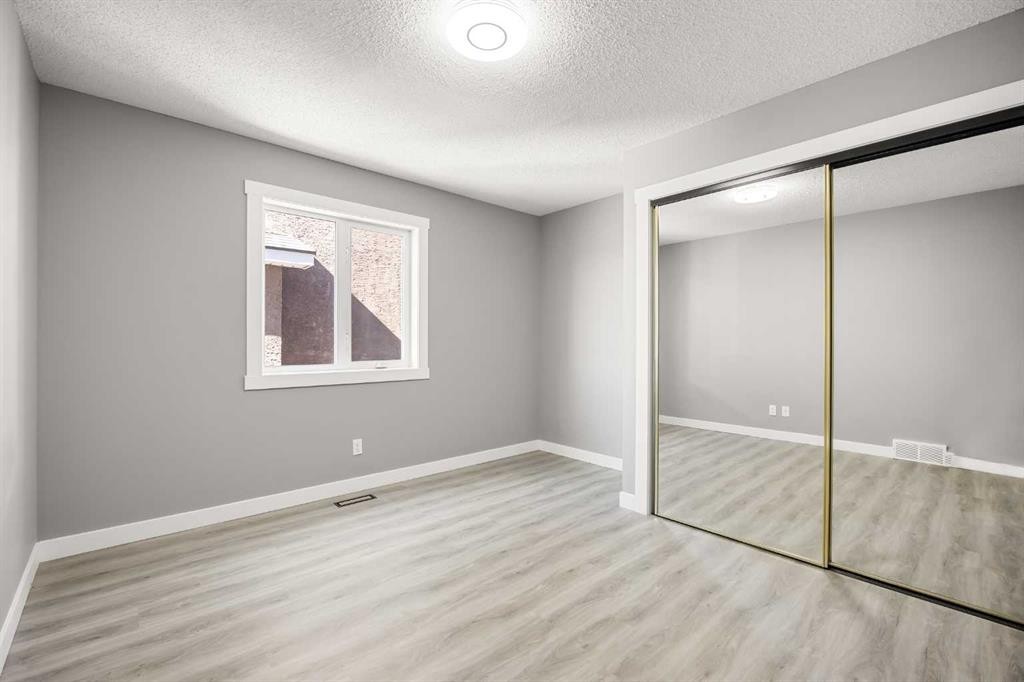 151 Coral Shores Landing Ne, Calgary, AB - Indoor Photo Showing Other Room