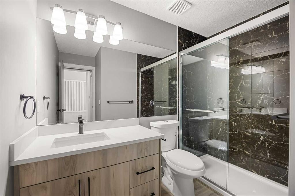 151 Coral Shores Landing Ne, Calgary, AB - Indoor Photo Showing Bathroom