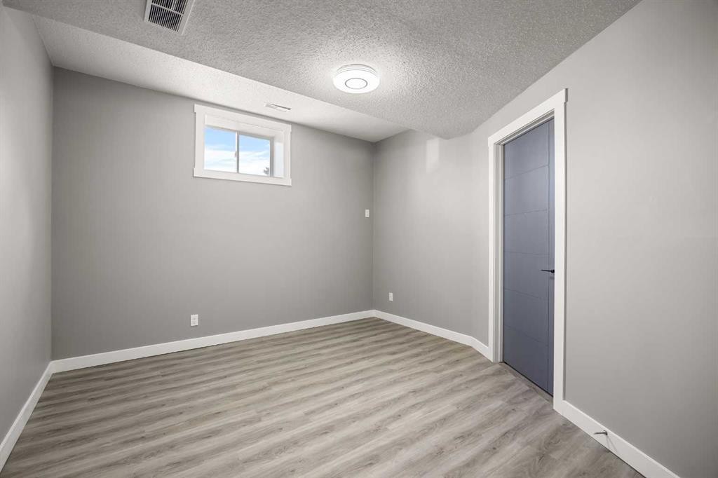 151 Coral Shores Landing Ne, Calgary, AB - Indoor Photo Showing Other Room