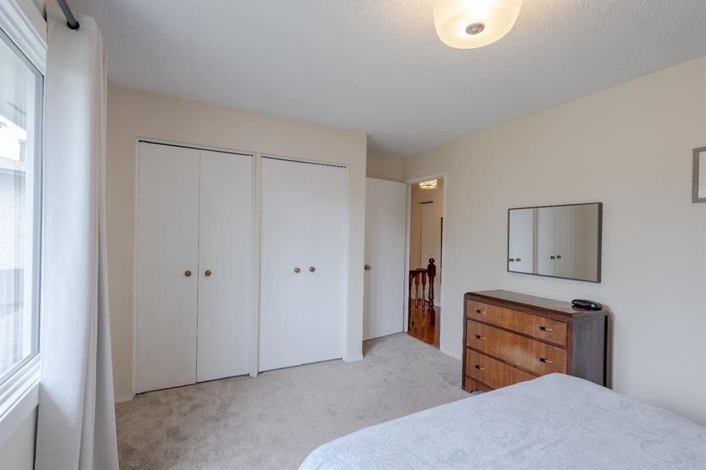 119 Midland Place Se, Calgary, AB - Indoor Photo Showing Bedroom