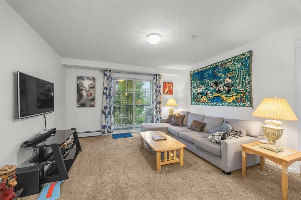 5209-279 Copperpond Common Se, Calgary, AB - Indoor Photo Showing Living Room