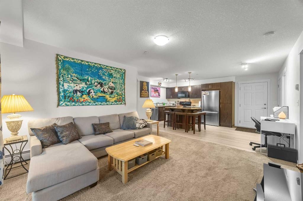 5209-279 Copperpond Common Se, Calgary, AB - Indoor Photo Showing Living Room