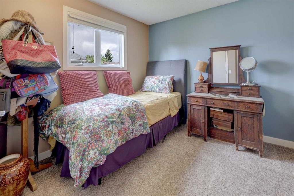 148 Rundlecairn Rise Ne, Calgary, AB - Indoor Photo Showing Bedroom