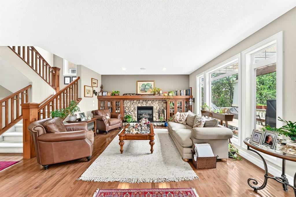 1748 Hidden Creek Way Nw, Calgary, AB - Indoor Photo Showing Living Room With Fireplace