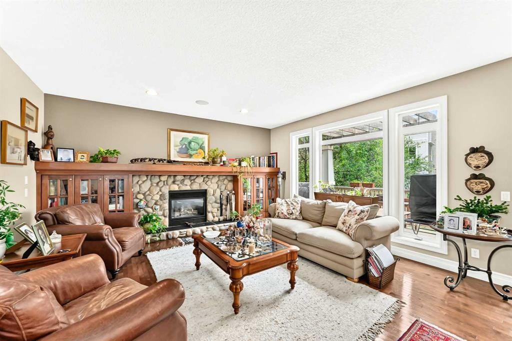 1748 Hidden Creek Way Nw, Calgary, AB - Indoor Photo Showing Living Room With Fireplace