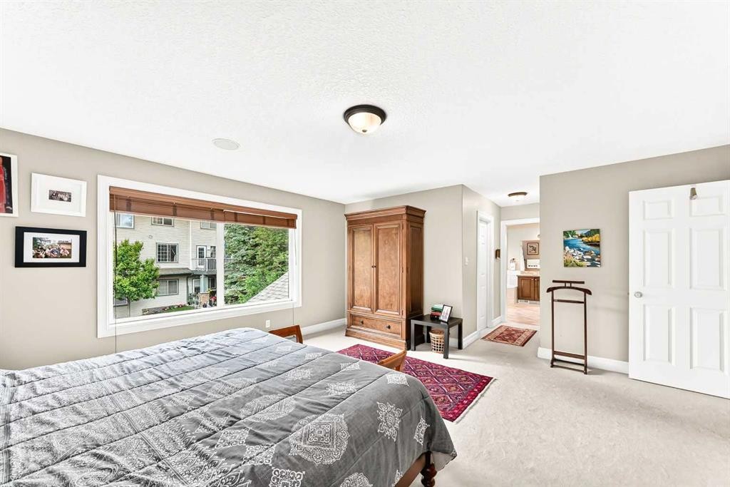1748 Hidden Creek Way Nw, Calgary, AB - Indoor Photo Showing Bedroom