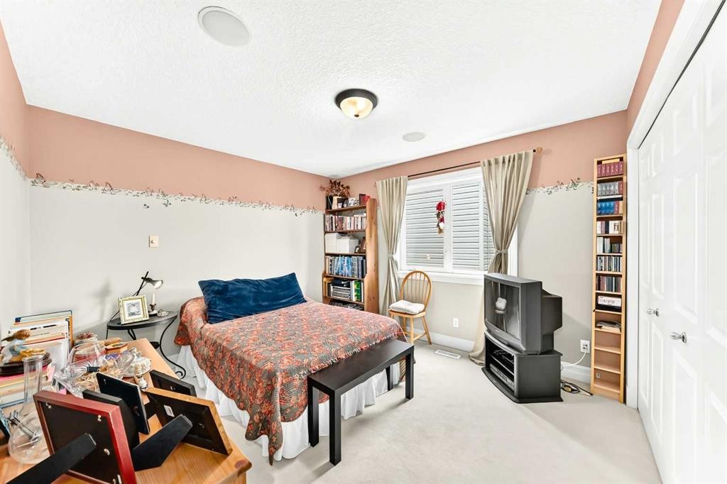 1748 Hidden Creek Way Nw, Calgary, AB - Indoor Photo Showing Bedroom