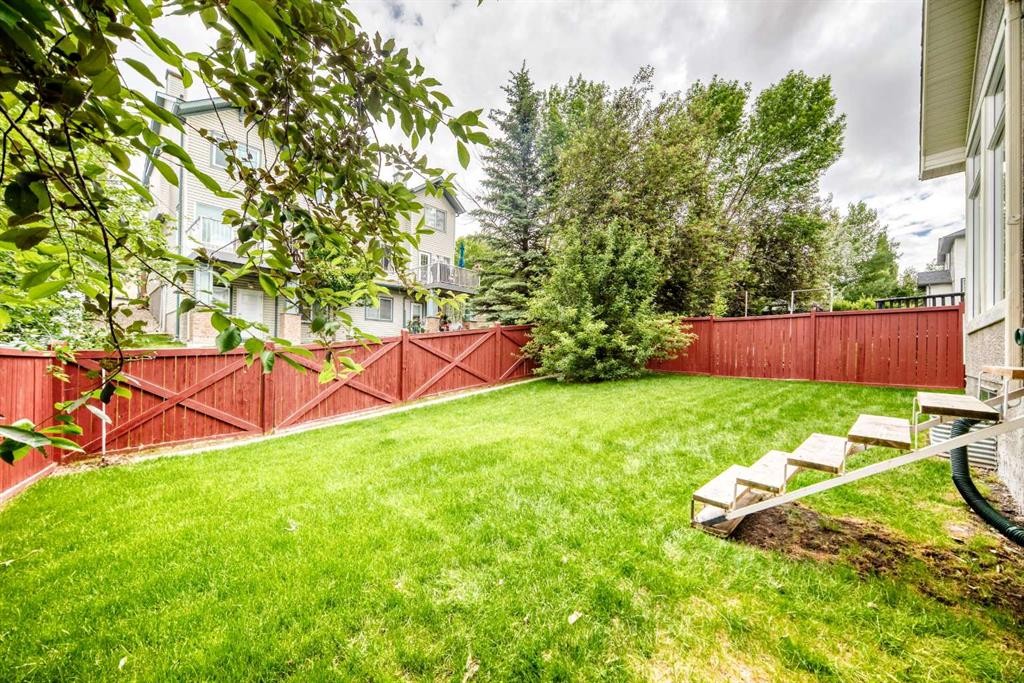 1748 Hidden Creek Way Nw, Calgary, AB - Outdoor With Backyard