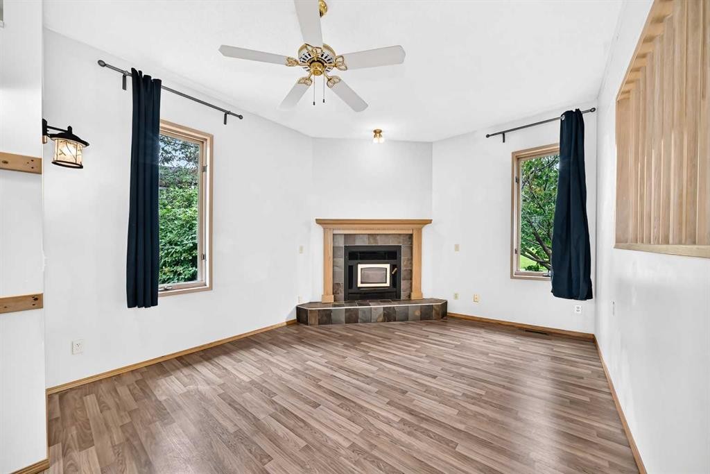 42 Cardiff Drive Nw, Calgary, AB - Indoor Photo Showing Living Room With Fireplace