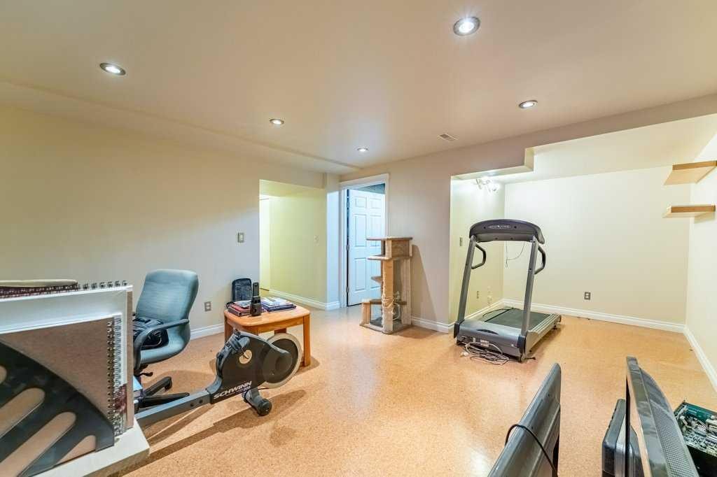 250 Mt Lorette Close Se, Calgary, AB - Indoor Photo Showing Gym Room