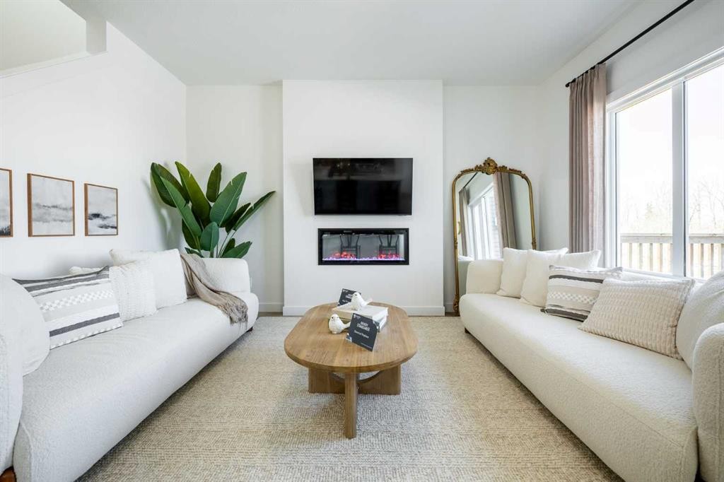 500 Savanna Crescent Ne, Calgary, AB - Indoor Photo Showing Living Room With Fireplace