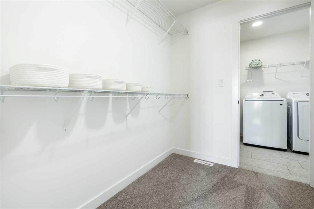 500 Savanna Crescent Ne, Calgary, AB - Indoor Photo Showing Laundry Room