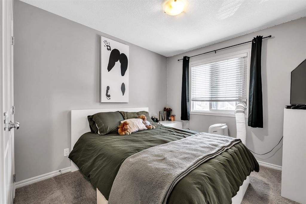 72 Legacy Mews Se, Calgary, AB - Indoor Photo Showing Bedroom