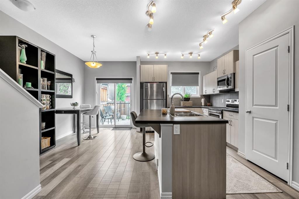 72 Legacy Mews Se, Calgary, AB - Indoor Photo Showing Kitchen With Stainless Steel Kitchen With Double Sink With Upgraded Kitchen