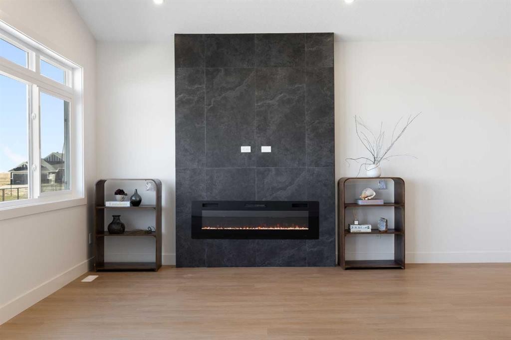 26 St Andrews Close, Lyalta, AB - Indoor Photo Showing Other Room With Fireplace