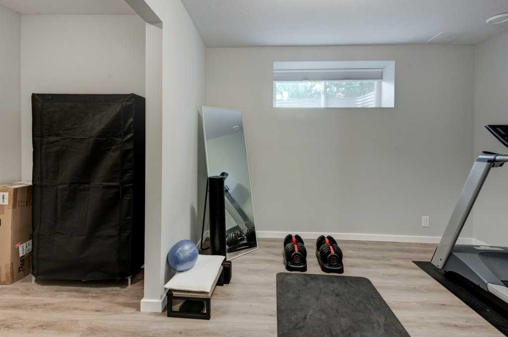 1293 Legacy Circle Se, Calgary, AB - Indoor Photo Showing Gym Room