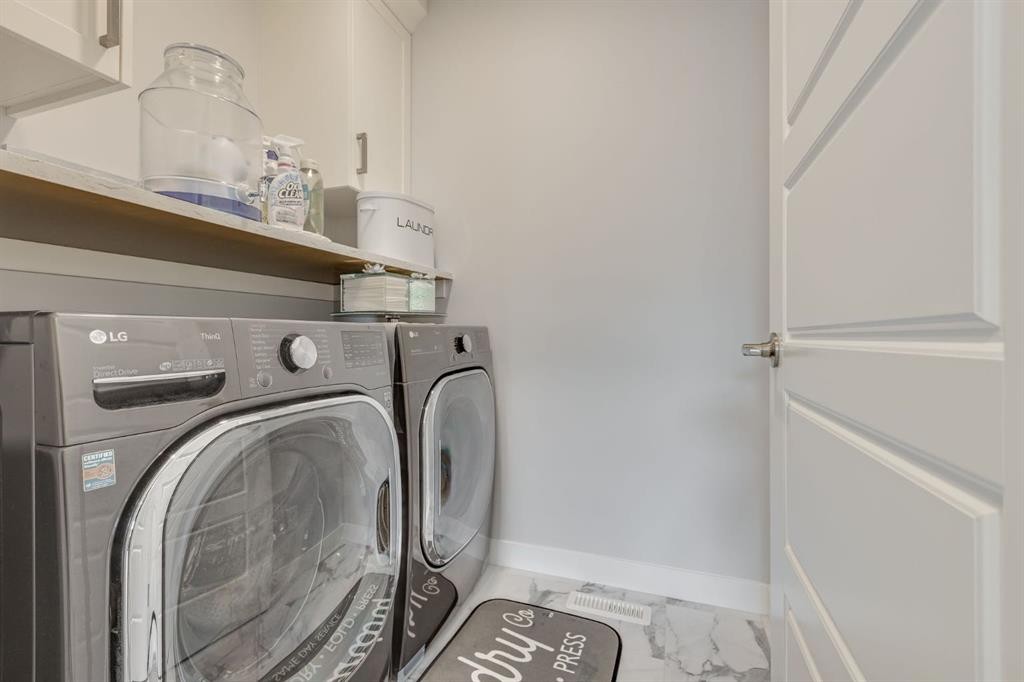 107 Howse Road Ne, Calgary, AB - Indoor Photo Showing Laundry Room