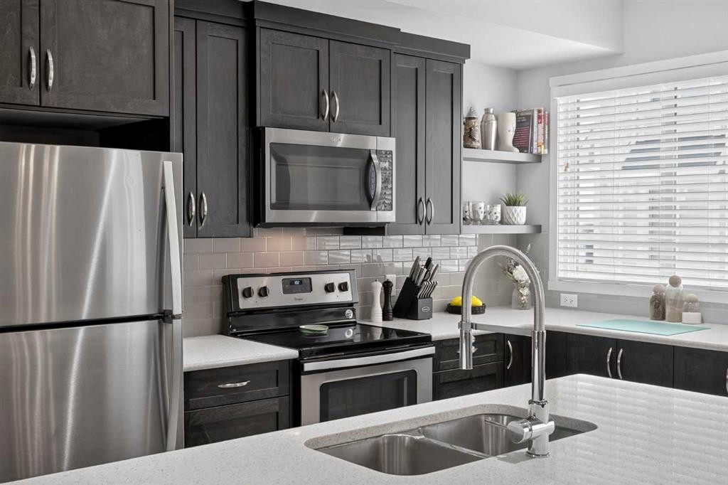 412 Nolanlake Villas Nw, Calgary, AB - Indoor Photo Showing Kitchen With Double Sink With Upgraded Kitchen