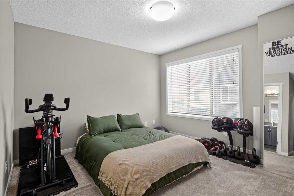 412 Nolanlake Villas Nw, Calgary, AB - Indoor Photo Showing Bedroom