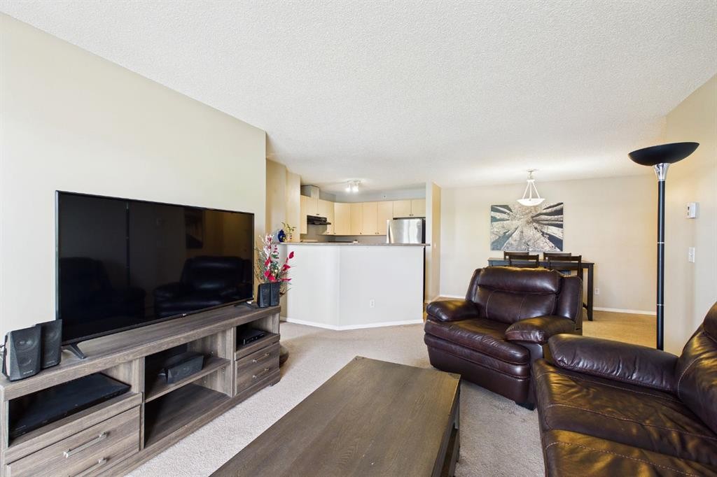 2305-2371 Eversyde Avenue Sw, Calgary, AB - Indoor Photo Showing Living Room