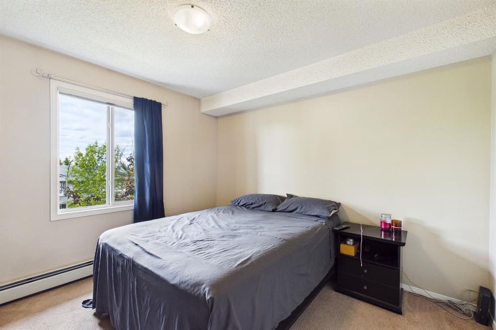 2305-2371 Eversyde Avenue Sw, Calgary, AB - Indoor Photo Showing Bedroom