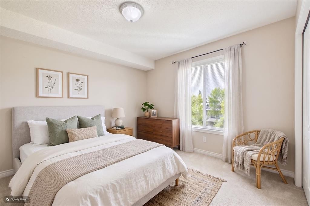 2305-2371 Eversyde Avenue Sw, Calgary, AB - Indoor Photo Showing Bedroom