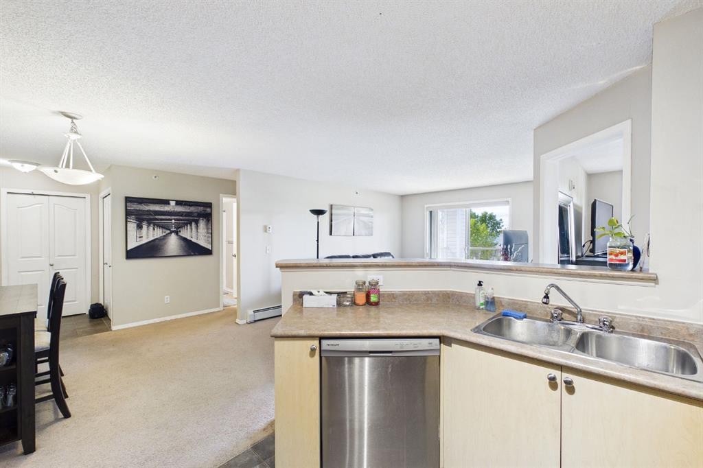 2305-2371 Eversyde Avenue Sw, Calgary, AB - Indoor Photo Showing Kitchen With Double Sink