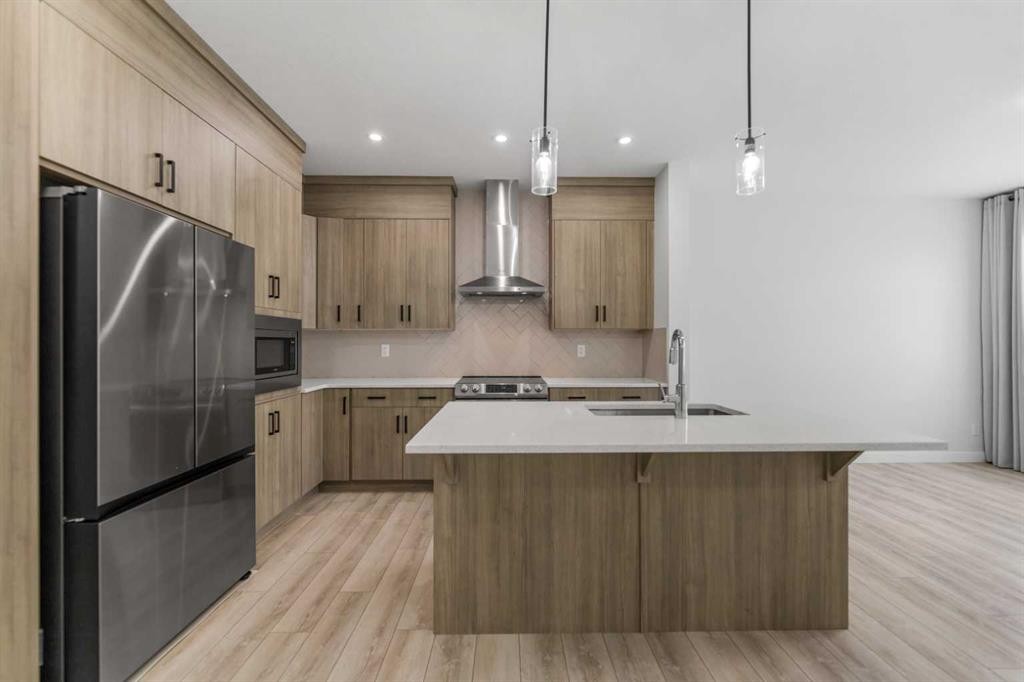 150 Ambleton Drive Nw, Calgary, AB - Indoor Photo Showing Kitchen With Stainless Steel Kitchen With Upgraded Kitchen