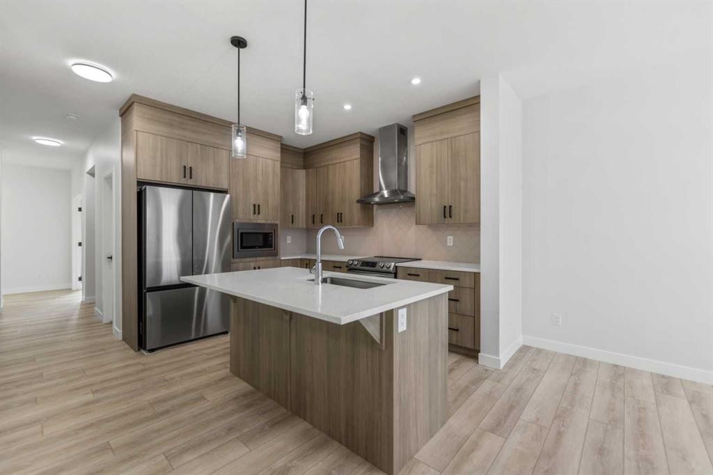 150 Ambleton Drive Nw, Calgary, AB - Indoor Photo Showing Kitchen With Stainless Steel Kitchen With Upgraded Kitchen