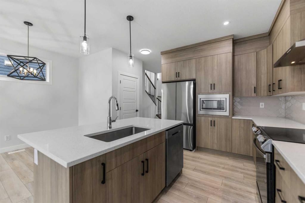 150 Ambleton Drive Nw, Calgary, AB - Indoor Photo Showing Kitchen With Stainless Steel Kitchen With Upgraded Kitchen