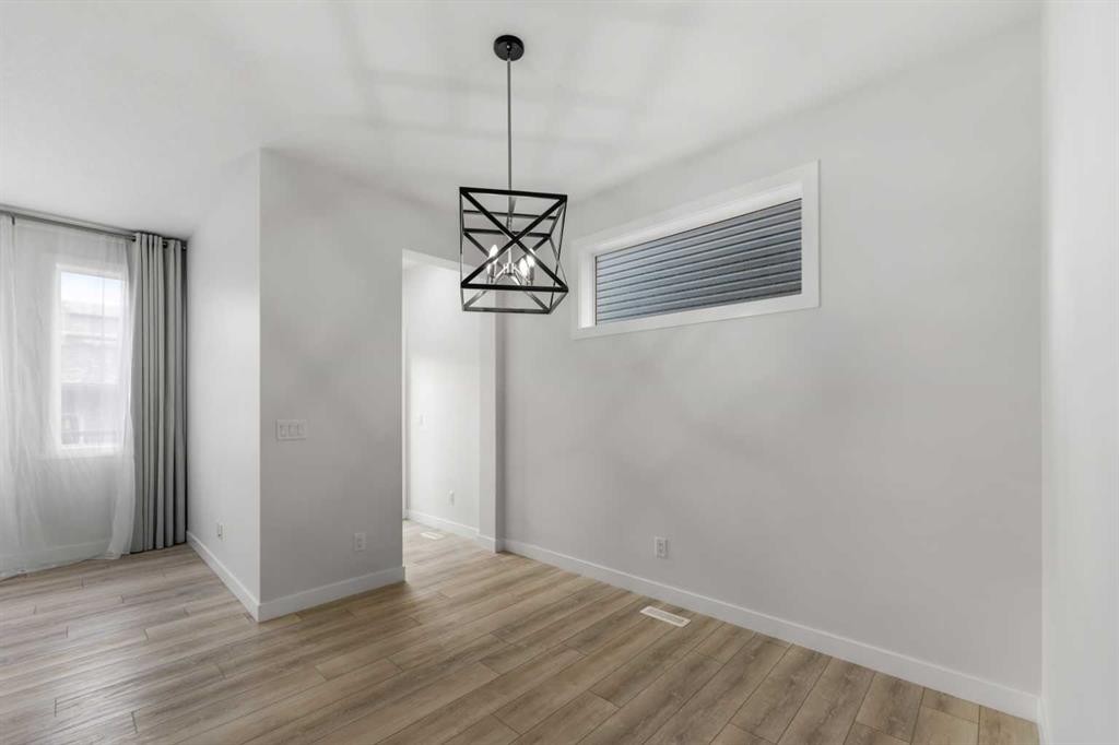 150 Ambleton Drive Nw, Calgary, AB - Indoor Photo Showing Other Room