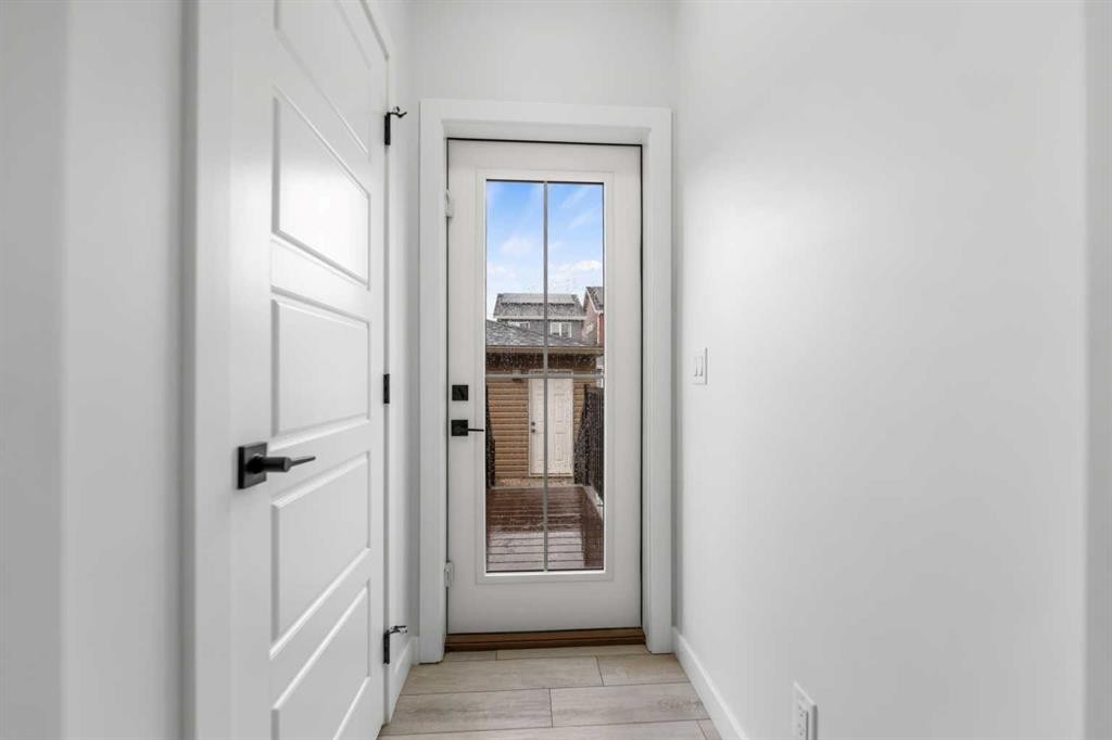 150 Ambleton Drive Nw, Calgary, AB - Indoor Photo Showing Other Room
