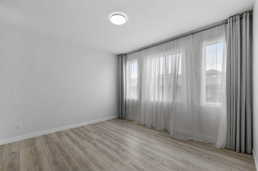 150 Ambleton Drive Nw, Calgary, AB - Indoor Photo Showing Other Room