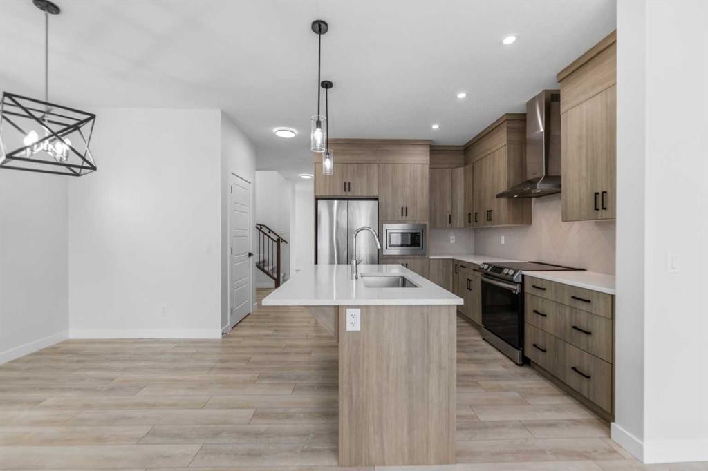 150 Ambleton Drive Nw, Calgary, AB - Indoor Photo Showing Kitchen With Stainless Steel Kitchen With Upgraded Kitchen