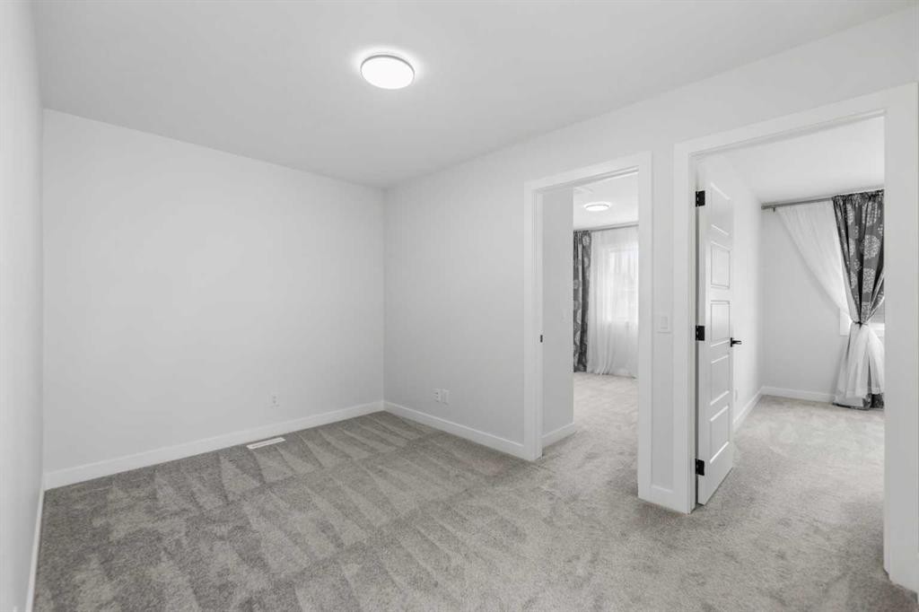150 Ambleton Drive Nw, Calgary, AB - Indoor Photo Showing Other Room