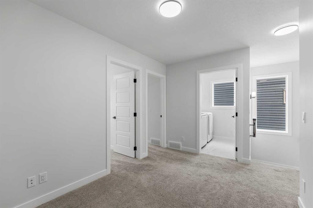 150 Ambleton Drive Nw, Calgary, AB - Indoor Photo Showing Other Room